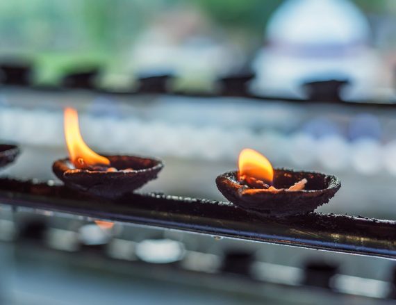 coconut-oil-lamps-in-temple-QNZ5WFT.jpg